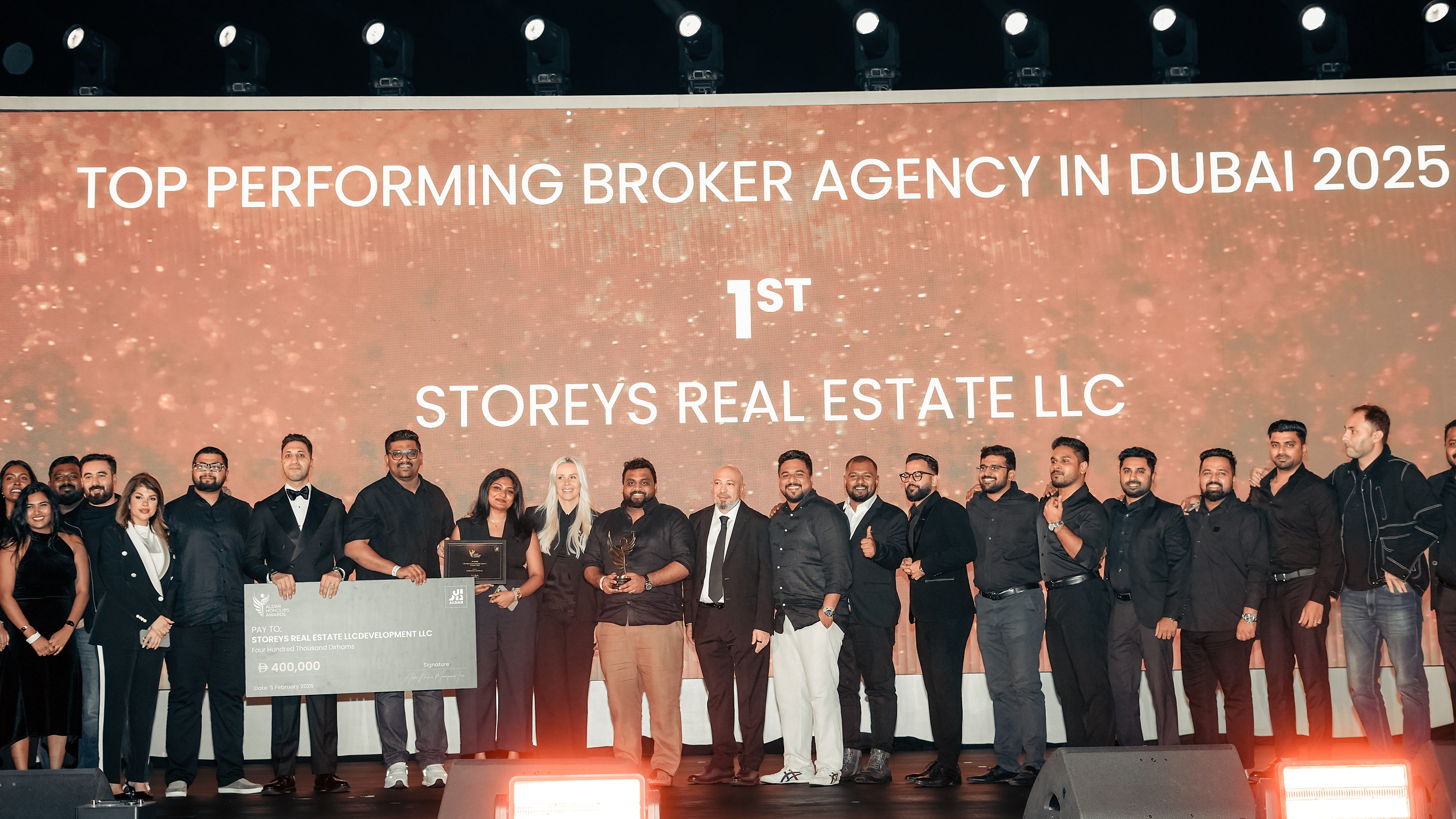 Storeys team on stage at the Aldar Honours Awards, 1st Place Top Performing Broker Agency in Dubai 2025